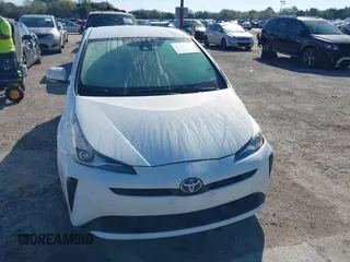2022 Toyota Prius L Eco with VIN JTDKAMFUXN3163123, listed as a IAAI auction lot 41666679 with 68,026 mi miles. Bid and sale history available at carsss.com. Image 12.