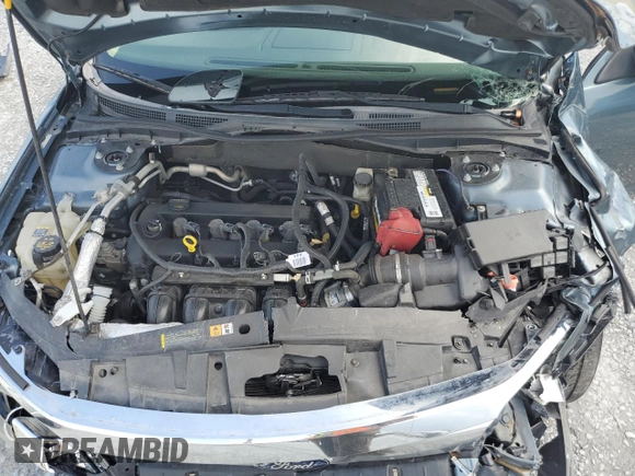2012 Ford Fusion SE z VIN 3FAHP0HA1CR372744, wystawiony jako Copart lot #59118315 z przebiegiem Nie podano mil oraz Szkoda całkowita • Salvage title. Historia ofert i sprzedaży dostępna na DreamBid. Obrazek 11.