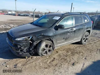 2018 Jeep Cherokee Latitude with VIN 1C4PJMCX8JD601680, listed as a IAAI auction lot 41442741 with 174,519 mi miles. Bid and sale history available at carsss.com. Image 2.