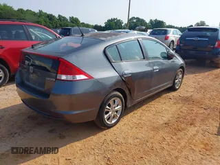 2010 Honda Insight EX with VIN JHMZE2H74AS027020, listed as a IAAI auction lot 42394875 with 248,003 mi miles and . Bid and sale history available at DreamBid. Image 4.