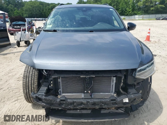 2022 Volkswagen Tiguan SE R-Line Black with VIN 3VV8B7AX0NM091052, listed as a Copart auction lot 60020515 with 46,687 mi miles and Salvage title. Bid and sale history available at DreamBid. Image 5.