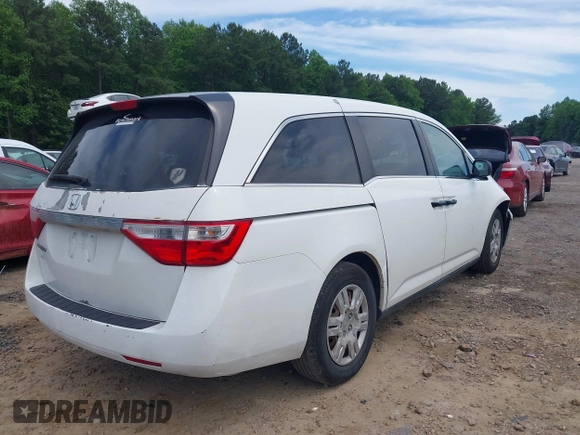 2012 Honda Odyssey LX z VIN 5FNRL5H28CB096385, wystawiony jako IAAI lot #42304664 z przebiegiem 105 010 mil mil oraz . Historia ofert i sprzedaży dostępna na DreamBid. Obrazek 4.