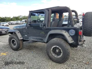 2004 Jeep Wrangler Rubicon with VIN 1J4FA69S54P769356, listed as a Copart auction lot 74089914 with 0 mi miles and Salvage Title. Bid and sale history available at carsss.com. Image 2.