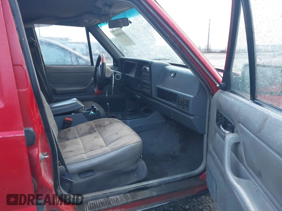 1996 Jeep Cherokee Sport with VIN 1J4FJ68S4TL244893, listed as a IAAI auction lot 41190369 with 192,459 mi miles and . Bid and sale history available at DreamBid. Image 5.