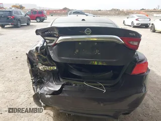 2016 Nissan Maxima SL z VIN 1N4AA6AP1GC379279, wystawiony jako IAAI lot #41738089 z przebiegiem 113 677 mil mil oraz . Historia ofert i sprzedaży dostępna na DreamBid. Obrazek 16.