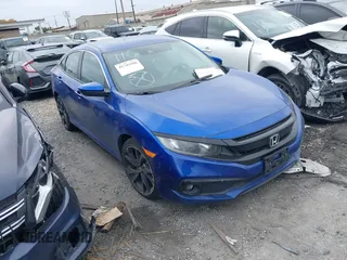 2021 Honda Civic Sport with VIN 2HGFC2F87MH554620, listed as a IAAI auction lot 41743596 with 52,327 mi miles and . Bid and sale history available at DreamBid. Image 1.