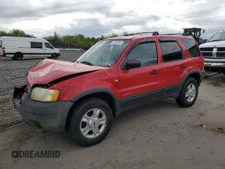 2002 Ford Escape XLT Choice with VIN 1FMCU04132KB16848, listed as a Copart auction lot 55266595 with 205,451 mi miles and Salvage title. Bid and sale history available at DreamBid. Image 1.