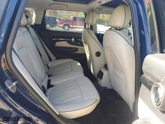 2017 MINI Clubman Cooper S with VIN WMWLU5C51H2E81530, listed as a Copart auction lot 76809344 with 111,814 mi miles and Clean Title. Bid and sale history available at carsss.com. Image 10.