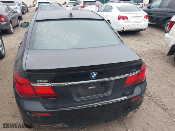 2015 BMW 7 Series 750i xDrive with VIN WBAYB6C57FD965802, listed as a IAAI auction lot 40588698 with 999,999 mi miles. Bid and sale history available at carsss.com. Image 15.