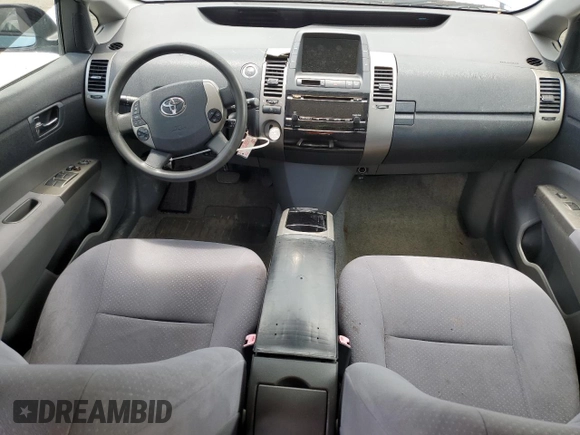 2007 Toyota Prius с VIN JTDKB20UX77690407, выставлен на аукционе Copart как лот 60980445 с пробегом 108 686 миль миль и Списание • Salvage title. История ставок и продаж доступна на DreamBid. Изображение 8.