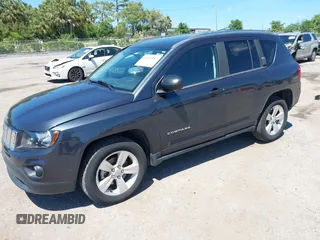 2015 Jeep Compass Sport with VIN 1C4NJDBB9FD135066, listed as a IAAI auction lot 42022157 with 98,632 mi miles. Bid and sale history available at carsss.com. Image 2.