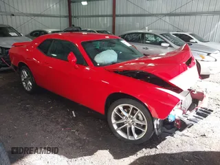 2022 Dodge Challenger GT z VIN 2C3CDZKG2NH160680, wystawiony jako IAAI lot #41882578 z przebiegiem 53 827 mil mil oraz . Historia ofert i sprzedaży dostępna na DreamBid. Obrazek 1.