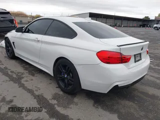 2014 BMW 4 Series 428i xDrive with VIN WBA3N5C56EK196702, listed as a IAAI auction lot 40934482 with 120,292 mi miles. Bid and sale history available at carsss.com. Image 3.