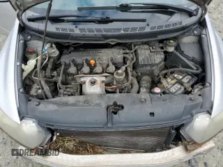 2009 Honda Civic Cpe EX with VIN 2HGFG128X9H502832, listed as a Copart auction lot 53076095 with 147,497 mi miles and Salvage Title. Bid and sale history available at carsss.com. Image 11.