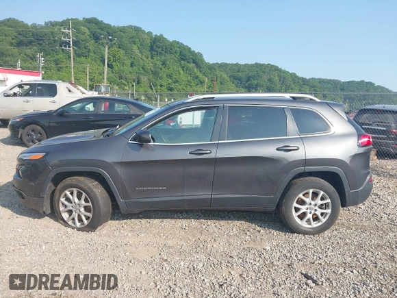 2016 Jeep Cherokee Altitude with VIN 1C4PJMCB0GW262916, listed as a IAAI auction lot 42392735 with 29,162 mi miles and . Bid and sale history available at DreamBid. Image 14.
