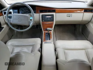 1992 Cadillac Seville z VIN 1G6KY53BXNU804126, wystawiony jako Copart lot #69219394 z przebiegiem 100 647 mil mil oraz Czysty tytuł • Clean title. Historia ofert i sprzedaży dostępna na DreamBid. Obrazek 8.