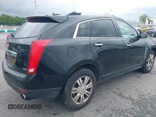 2015 Cadillac SRX Luxury Collection z VIN 3GYFNEE34FS510360, wystawiony jako IAAI lot #42343737 z przebiegiem 149 046 mil mil oraz . Historia ofert i sprzedaży dostępna na DreamBid. Obrazek 4.
