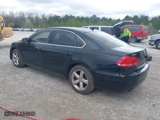 2013 Volkswagen Passat SE w/Sunroof with VIN 1VWBH7A31DC113637, listed as a IAAI auction lot 41854340 with 188,606 mi miles. Bid and sale history available at carsss.com. Image 3.