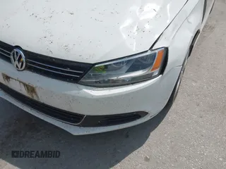 2013 Volkswagen Jetta SE z VIN 3VWDX7AJXDM297095, wystawiony jako IAAI lot #42664873 z przebiegiem 69 061 mil mil oraz . Historia ofert i sprzedaży dostępna na DreamBid. Obrazek 6.