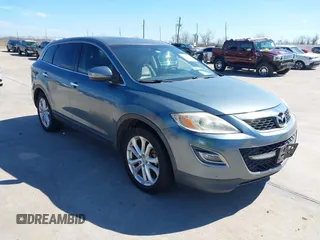 2012 Mazda CX-9 Grand Touring z VIN JM3TB2DAXC0339785, wystawiony jako IAAI lot #41659714 z przebiegiem 74 796 mil mil oraz . Historia ofert i sprzedaży dostępna na DreamBid. Obrazek 1.