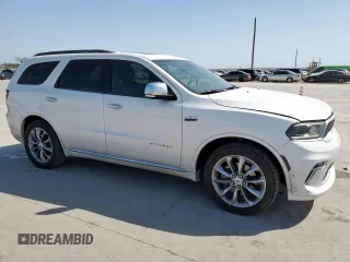 2021 Dodge Durango Citadel with VIN 1C4SDHET0MC641166, listed as a Copart auction lot 50291275 with 101,467 mi miles and Salvage Title. Bid and sale history available at DreamBid. Image 4.