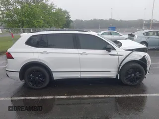 2022 Volkswagen Tiguan SE R-Line Black with VIN 3VV8B7AX6NM027050, listed as a IAAI auction lot 42463714 with 45,303 mi miles and . Bid and sale history available at DreamBid. Image 13.