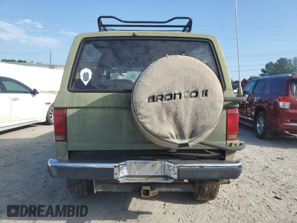 1987 Ford Bronco z VIN 1FMCU14T6HUC98971, wystawiony jako Copart lot #69262784 z przebiegiem 49 522 mil mil oraz Czysty tytuł • Clean title. Historia ofert i sprzedaży dostępna na DreamBid. Obrazek 6.