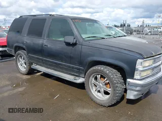 1999 Chevrolet Tahoe Z71 with VIN 1GNEK13R1XJ425996, listed as a IAAI auction lot 41798943 with 203,106 mi miles and . Bid and sale history available at DreamBid. Image 1.