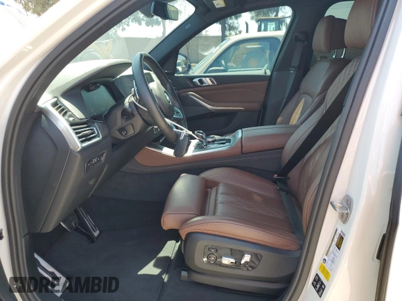 2019 BMW X5 xDrive40i with VIN 5UXCR6C57KLK85504, listed as a Copart auction lot 60908665 with 21,333 mi miles and Salvage title. Bid and sale history available at DreamBid. Image 7.