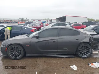 2020 Dodge Charger Scat Pack z VIN 2C3CDXGJXLH107344, wystawiony jako IAAI lot #41888453 z przebiegiem Nie podano mil oraz . Historia ofert i sprzedaży dostępna na DreamBid. Obrazek 15.