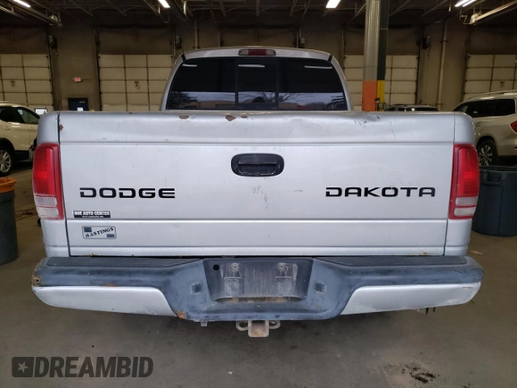 2004 Dodge Dakota Sport z VIN 1D7HG38N34S508009, wystawiony jako Copart lot #42217205 z przebiegiem 168 446 mil mil oraz Szkoda całkowita • Salvage title. Historia ofert i sprzedaży dostępna na DreamBid. Obrazek 6.