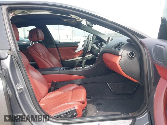 2014 BMW 6 Series 650i z VIN WBA6B2C55ED128934, wystawiony jako IAAI lot #42070641 z przebiegiem 102 597 mil mil oraz . Historia ofert i sprzedaży dostępna na DreamBid. Obrazek 5.