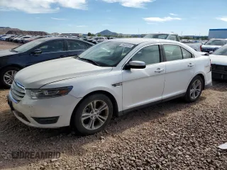2015 Ford Taurus SEL with VIN 1FAHP2E92FG172960, listed as a Copart auction lot 79465914 with 115,115 mi miles and Salvage Title. Bid and sale history available at DreamBid. Image 1.