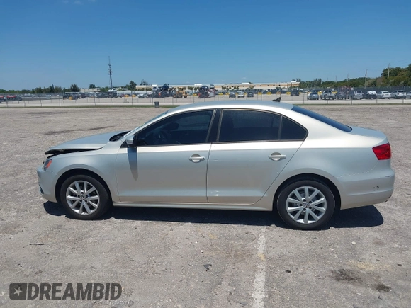 2011 Volkswagen Jetta Sedan SE w/Convenience & Sunroof with VIN 3VWDX7AJ9BM316541, listed as a IAAI auction lot 42037920 with 83,658 mi miles. Bid and sale history available at carsss.com. Image 14.