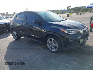 2021 Honda HR-V LX with VIN 3CZRU5H33MM730828, listed as a IAAI auction lot 41500882 with 48,503 mi miles. Bid and sale history available at carsss.com. Image 1.