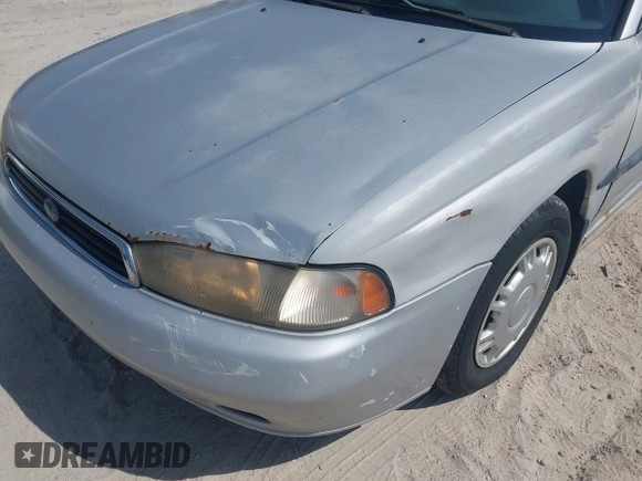 1996 Subaru Legacy L with VIN 4S3BK4352T6318494, listed as a IAAI auction lot 42162704 with 272,055 mi miles and . Bid and sale history available at DreamBid. Image 6.