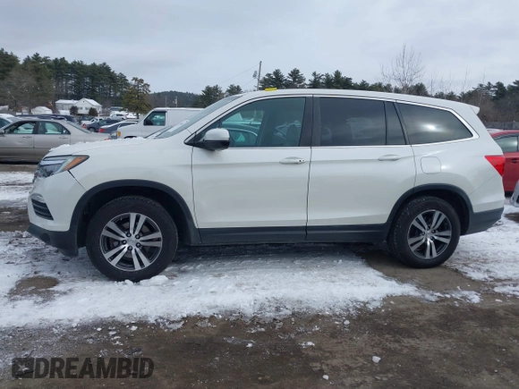 2017 Honda Pilot EX-L with VIN 5FNYF6H52HB015651, listed as a IAAI auction lot 41538814 with 121,433 mi miles and . Bid and sale history available at DreamBid. Image 14.
