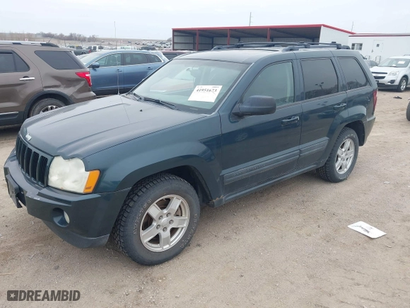 2006 Jeep Grand Cherokee Laredo with VIN 1J4GR48K96C172871, listed as a IAAI auction lot 41951673 with 170,978 mi miles. Bid and sale history available at carsss.com. Image 2.