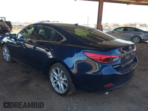 2016 Mazda 6 i Touring with VIN JM1GJ1T5XG1434388, listed as a IAAI auction lot 41528124 with 99,293 mi miles and . Bid and sale history available at DreamBid. Image 3.