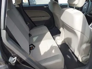 2011 Dodge Caliber Mainstreet with VIN 1B3CB3HA6BD121439, listed as a IAAI auction lot 42131091 with 92,850 mi miles. Bid and sale history available at carsss.com. Image 8.