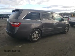 2011 Honda Odyssey EX-L with VIN 5FNRL5H64BB073266, listed as a Copart auction lot 84478964 with 207,991 mi miles and Salvage Title. Bid and sale history available at DreamBid. Image 3.