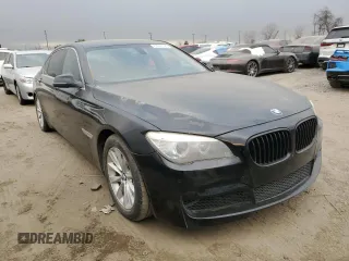 2015 BMW 7 Series 740Li with VIN WBAYE4C50FD947217, listed as a Copart auction lot 87899785 with Not provided miles and Salvage title. Bid and sale history available at DreamBid. Image 4.