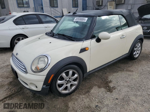 2010 MINI Convertible with VIN WMWMR3C52ATU96951, listed as a Copart auction lot 82038804 with 120,199 mi miles and Clean Title. Bid and sale history available at DreamBid. Image 1.