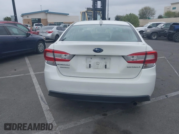 2021 Subaru Impreza Premium with VIN 4S3GKAV61M3604298, listed as a IAAI auction lot 42011198 with 50,667 mi miles and . Bid and sale history available at DreamBid. Image 17.