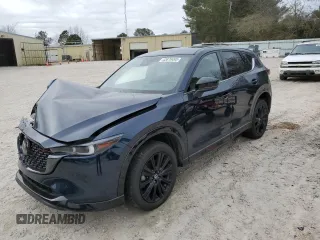 2022 Mazda CX-5 2.5 Turbo with VIN JM3KFBAY3N0603921, listed as a Copart auction lot 43679495 with 27,073 mi miles and Salvage Title. Bid and sale history available at carsss.com. Image 1.
