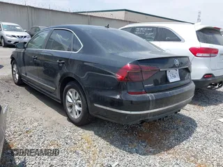 2016 Volkswagen Passat S with VIN 1VWAT7A30GC053798, listed as a IAAI auction lot 42104287 with 58,641 mi miles and . Bid and sale history available at DreamBid. Image 3.