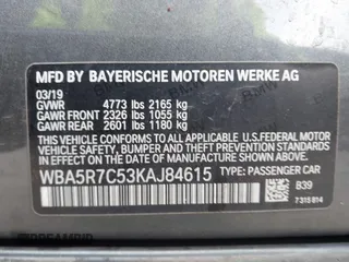 2019 BMW 3 Series 330i xDrive with VIN WBA5R7C53KAJ84615, listed as a IAAI auction lot 41774006 with Not provided miles and . Bid and sale history available at DreamBid. Image 9.