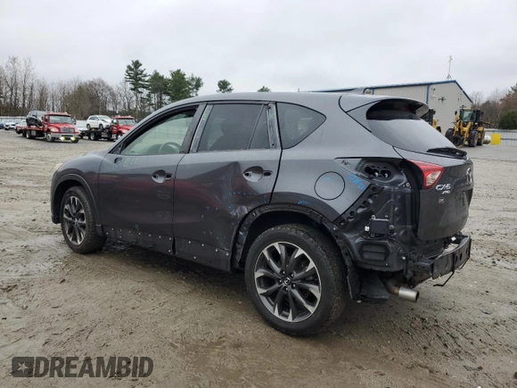 2016 Mazda CX-5 Grand Touring with VIN JM3KE4DY6G0834583, listed as a Copart auction lot 52015905 with 184,741 mi miles and Salvage Title. Bid and sale history available at DreamBid. Image 2.