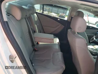 2006 Volkswagen Passat z VIN WVWFU93CX6P163702, wystawiony jako Copart lot #67068174 z przebiegiem 199 479 mil mil oraz Szkody całkowita. Historia ofert i sprzedaży dostępna na DreamBid. Obrazek 9.