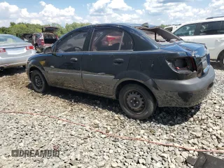 2009 Kia Rio LX with VIN KNADE223296539006, listed as a Copart auction lot 69229394 with 227,766 mi miles and Salvage Title. Bid and sale history available at DreamBid. Image 2.